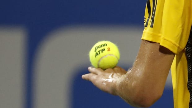 Aug 1, 2017; Washington, DC, USA; Dominic Thiem of Austria balances a ball on his hand prior to serving against Henri Laaksonen of Switzerland (not pictured) on day two of the Citi Open at Fitzgerald Tennis Center. Thiem won 6-3, 6-3. Mandatory Credit: Geoff Burke-USA TODAY Sports